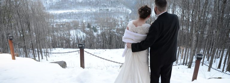 Stroudsmoor Country Inn - Stroudsburg - Wedding Resort - Married Couple Atop A Snowcovered Mountain