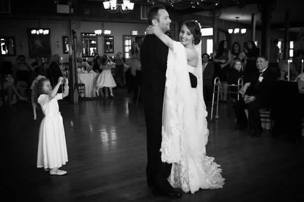 Stroudsmoor Country Inn - Stroudsburg - Poconos - Real Weddings - Flower Girl Capturing Photo Of Bride And Groom