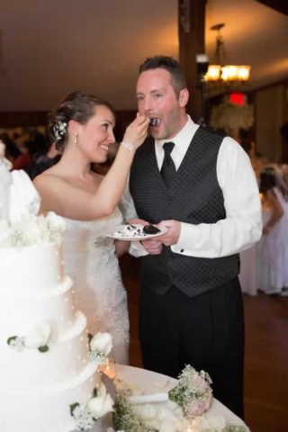 Stroudsmoor Country Inn - Stroudsburg - Poconos - Real Weddings - Bride Feeding Cake To Groom