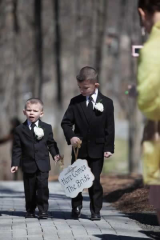 Stroudsmoor Country Inn - Stroudsburg - Poconos - Real Weddings - " Here Comes The Bride " Sign Being Carried By Ring Two Ring Bearers