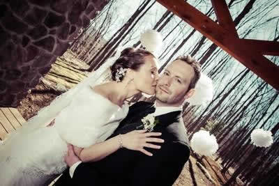 Stroudsmoor Country Inn - Stroudsburg - Poconos - Real Weddings - Bride Giving Groom Quick Kiss On Cheek