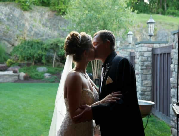 Stroudsmoor Country Inn - Stroudsburg - Poconos - Real Weddings - Bride And Groom Exchanging Several First Kisses
