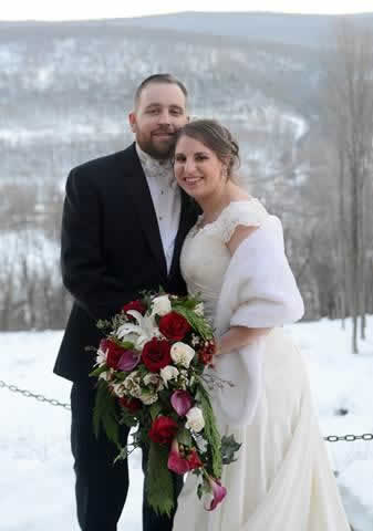 Stroudsmoor Country Inn - Stroudsburg - Poconos - Real Weddings - Bride And Groom Backed By Snow Covered Mountains