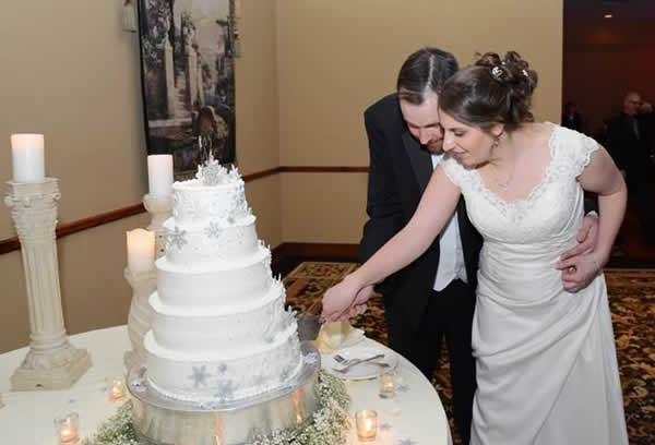 Stroudsmoor Country Inn - Stroudsburg - Poconos - Real Weddings - Bride And Groom Cutting Cake
