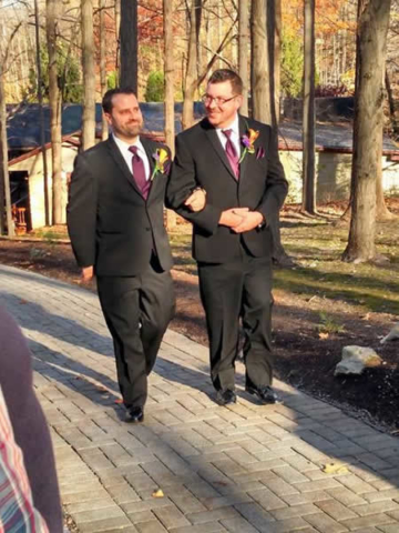 Stroudsmoor Country Inn - Stroudsburg - Poconos - Real Weddings - Happy Couple Walking Arm In Arm