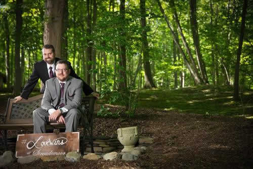 Stroudsmoor Country Inn - Stroudsburg - Poconos - Real Weddings - Couple Pose For Quick Photo Outside