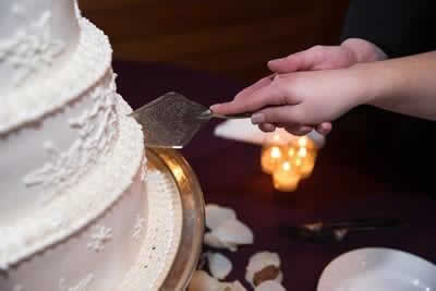 Stroudsmoor Country Inn - Stroudsburg - Poconos - Real Weddings - Bride And Groom Cutting Into The Cake