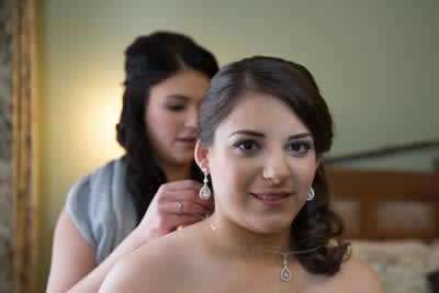 Stroudsmoor Country Inn - Stroudsburg - Poconos - Real Weddings - Bride Putting Necklace On