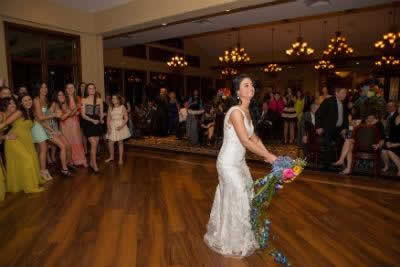Stroudsmoor Country Inn - Stroudsburg - Poconos - Real Weddings - Bride Throwing Wedding Bouquet