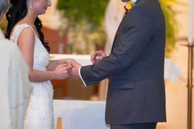 Stroudsmoor Country Inn - Stroudsburg - Poconos - Real Weddings - Groom Putting Ring On Brides Finger