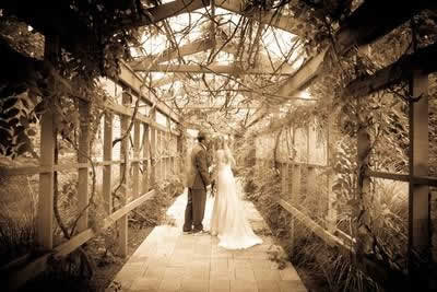 Stroudsmoor Country Inn - Stroudsburg - Poconos - Real Weddings - Bride And Groom Under Trellis