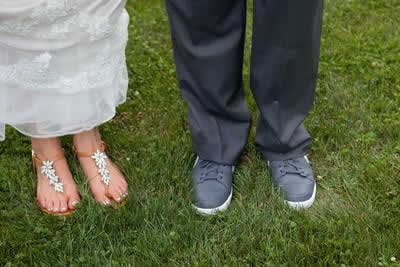 Stroudsmoor Country Inn - Stroudsburg - Poconos - Real Weddings - Bride And Groom Showing Comfy Shoes On Their Feet