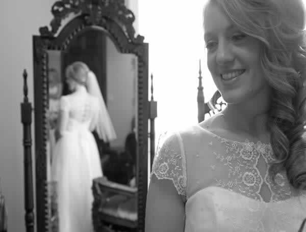 Stroudsmoor Country Inn - Stroudsburg - Poconos - Real Weddings - Bride Gazing At Reflection In Mirror
