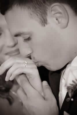 Stroudsmoor Country Inn - Stroudsburg - Poconos - Real Weddings - Groom Kissing Brides Hand