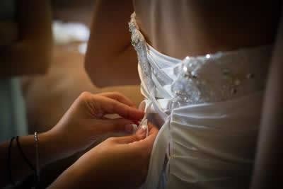Stroudsmoor Country Inn - Stroudsburg - Poconos - Real Weddings - Bride Lacing Wedding Dress