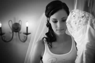 Stroudsmoor Country Inn - Stroudsburg - Poconos - Real Weddings - Bride Posing With Wedding Dress