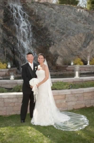 Stroudsmoor Country Inn - Stroudsburg - Poconos - Real Weddings - Couple Outside Near Garden With Waterfalls
