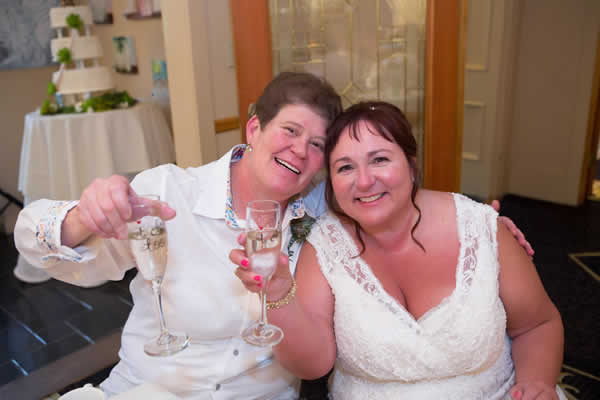 Stroudsmoor Country Inn - Stroudsburg - Poconos - Real Weddings - Happy Couple Toasting
