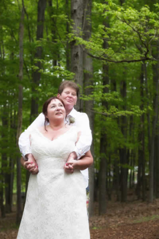 Stroudsmoor Country Inn - Stroudsburg - Poconos - Real Weddings - Happy Couple Surrounded By The Tall Trees