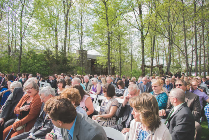 Wedding guests sitting at ceremony
