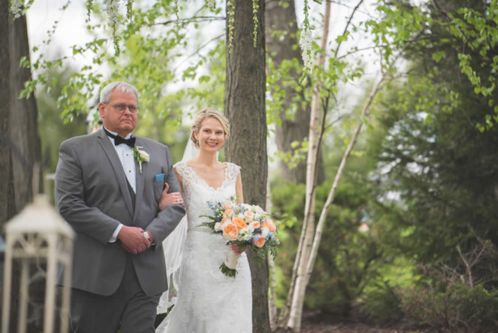 Father walking bride down the aisle