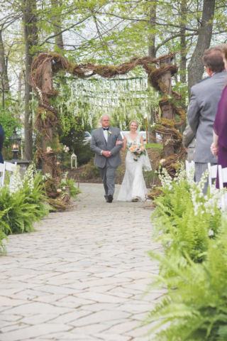 Father walking bride down the aisle