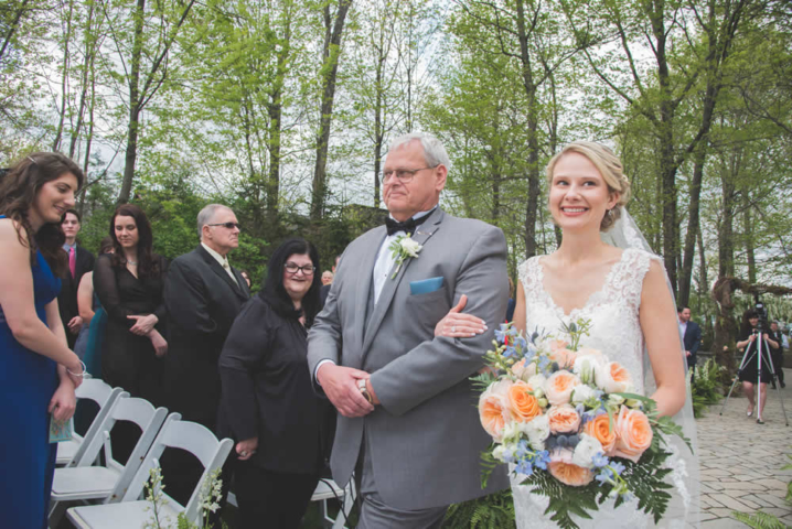 Father walking bride down the aisle