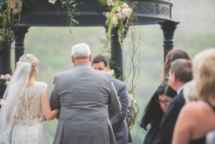 Father walking bride down the aisle