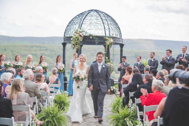 Bride and groom walking away after ceremony