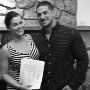 Stroudsmoor Country Inn - Wedding Warrior - Couple after signing wedding contract