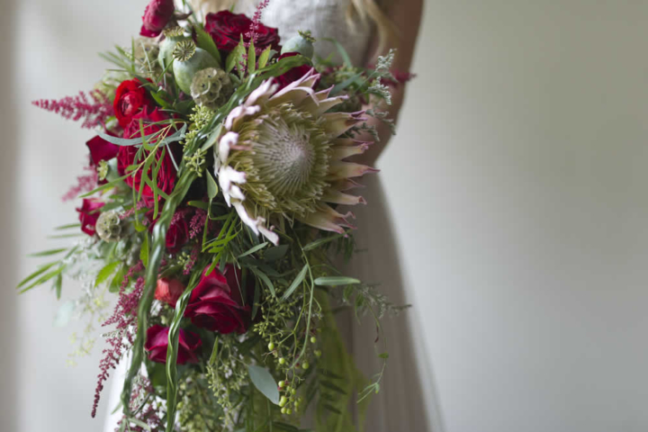 flowers A close up bouquet of red roses and white flowers