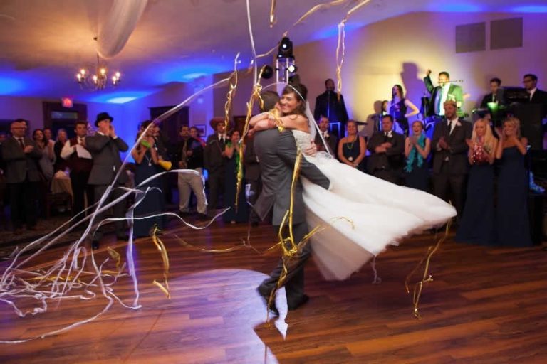 Wedding couple hugging on dance floor
