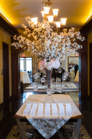 Beautiful table setting with flowers and crystal balls
