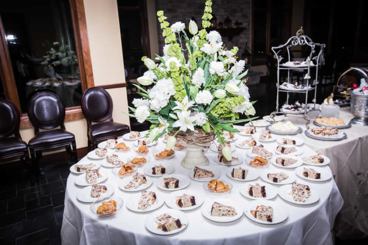 Dessert table with cake and pastries