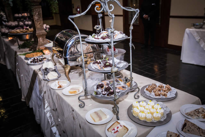 Dessert table with cake and pastries