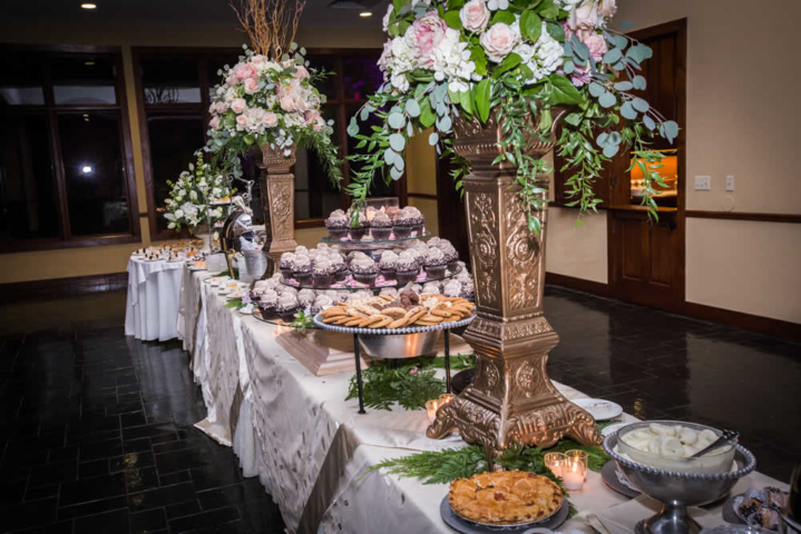 Dessert table with cake, pastries, cookies and pie