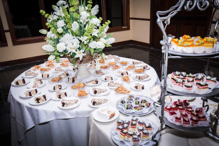 Dessert table with cake and pastries