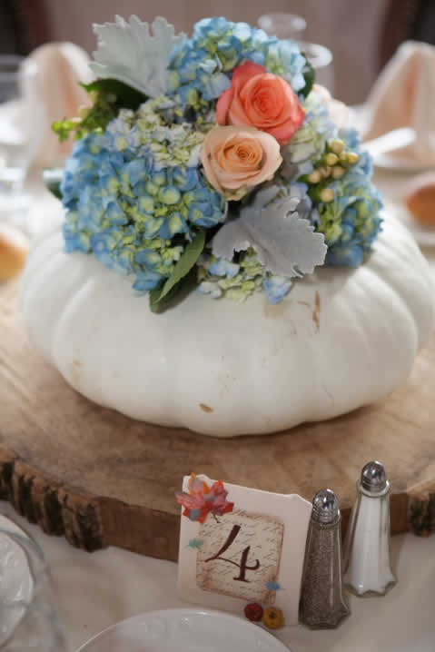 White pumpkin centerpiece with flowers