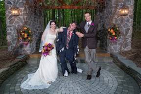 Wedding couple posing with zombie