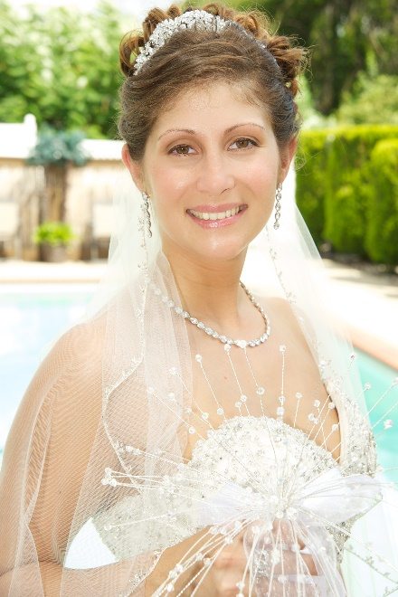 Bride smiling in her veil