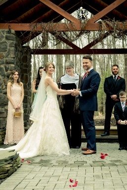 Wedding couple holding hands