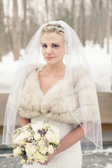 Winter bride in beautiful veil
