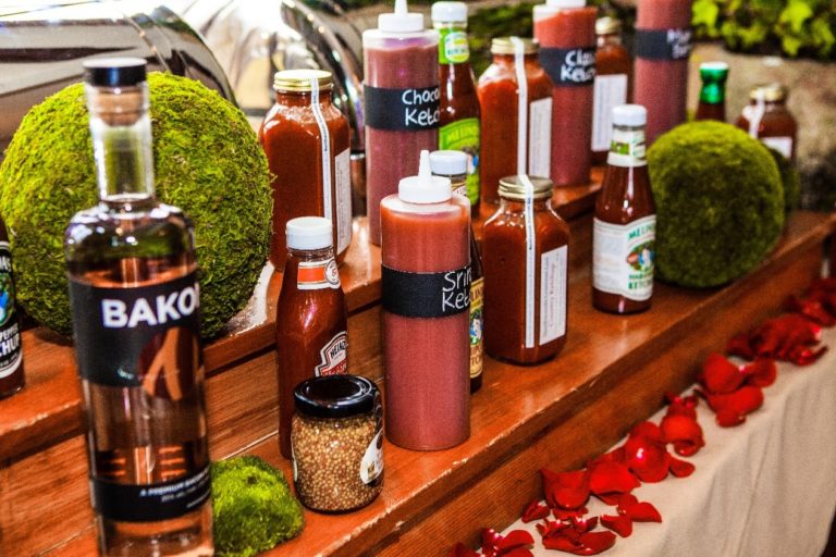 Themed wedding cakes depict bottles of ketchup standing upright