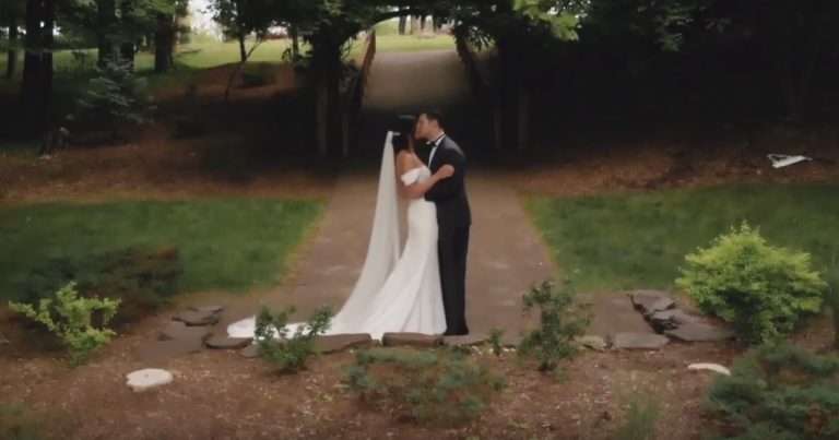 Wedding couple embracing - outdoor wedding