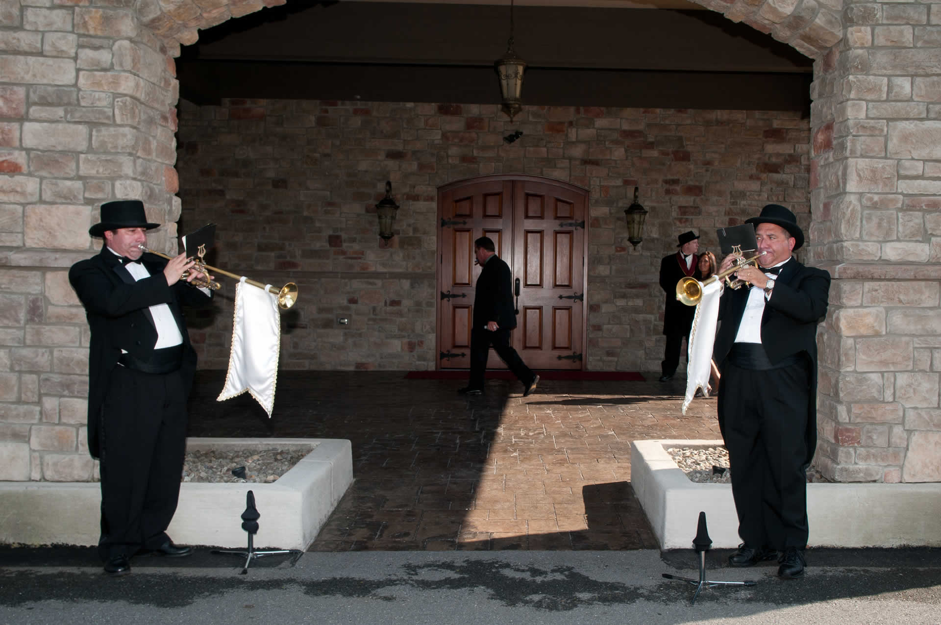 Men playing trumpet terraview