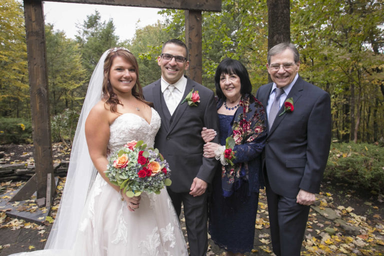 Bride and groom with grooms parents lawnhaven