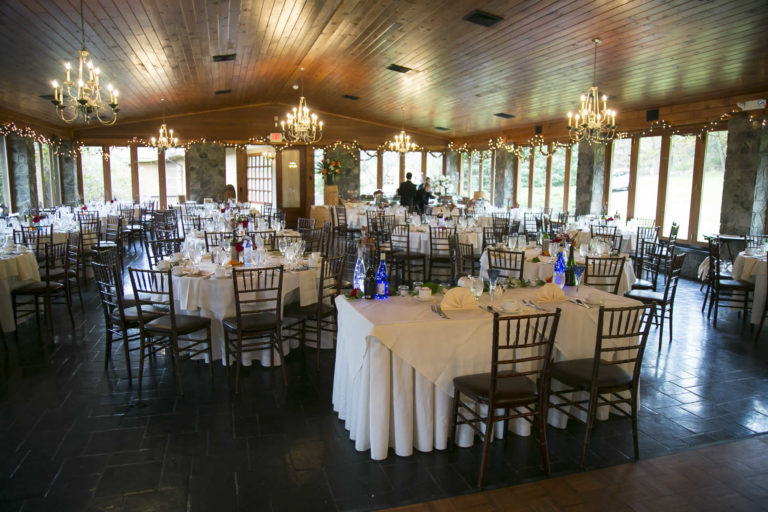 The dinning area decorated with floral decor, and beautiful lights lwanhaven