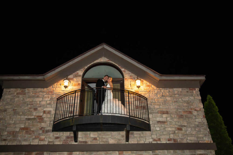 Wedding couple on balcony terraview
