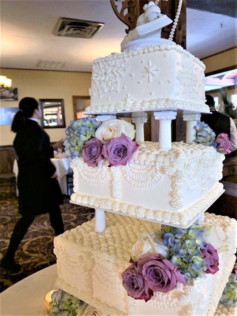 Beautiful decorated four layer wedding cake woodsgate