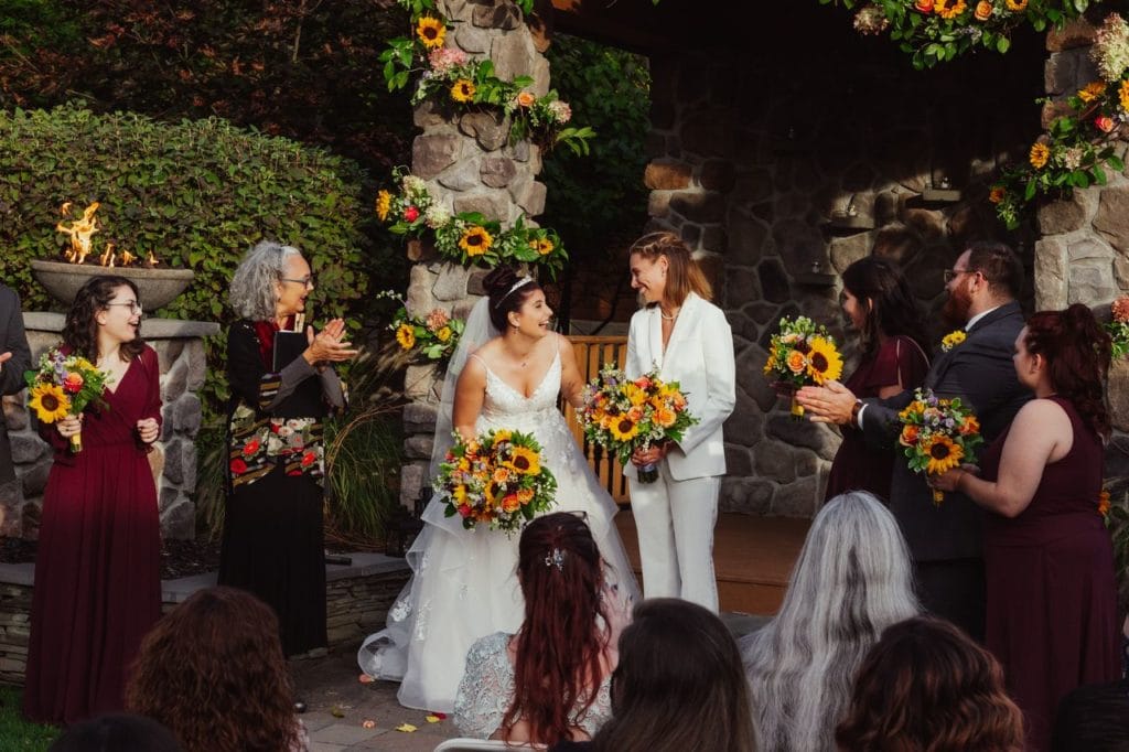 Wedding ceremony - bride and bride - happy wedding couple